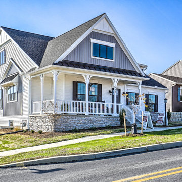 These black windows complement the home's white and gray siding