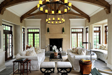 Example of a large classic formal and open concept living room design in New York with a standard fireplace, beige walls, a stone fireplace and no tv