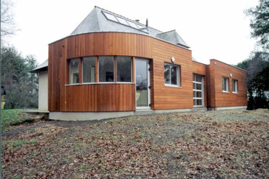 Cette image montre une façade de maison design.