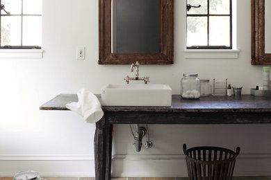 Example of a country home design design in Other