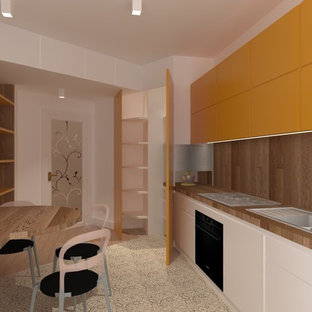 Modern kitchen pantry designs - Example of a minimalist porcelain floor kitchen pantry design in Other