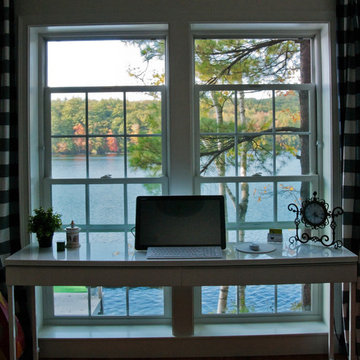 Large scale windows with deep sills let in the view!