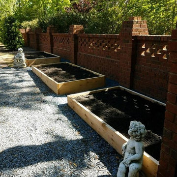 Raised Gardens, Urns, and Seasonal Plantings