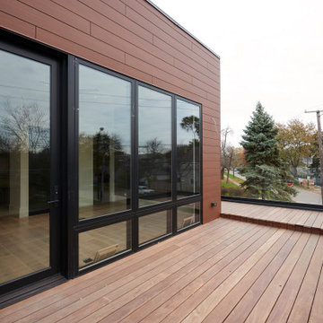 Upper-Level Deck with Warm Wood Cladding and Panoramic Glass