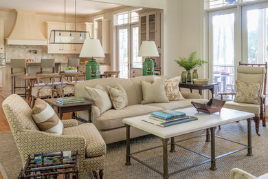 Mid-sized elegant open concept light wood floor living room photo in Charleston with white walls