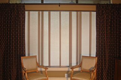 Embroidered faux silk drapes with Skyline Gliding panels