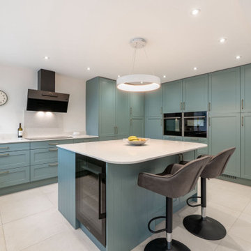 Aldana Kitchen in Light Teal by Kitchen Ergonomics