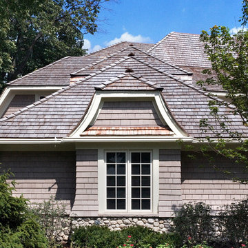 Cape Cod Stone and Shingle Style House with Box Bay Window and Cedar Shake Roof