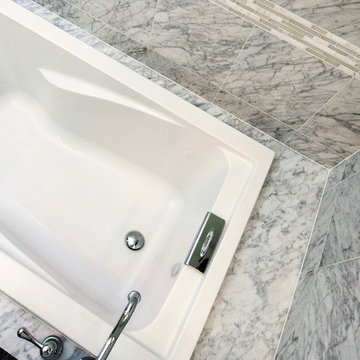 Quaint "Carrerra" Master Bathroom