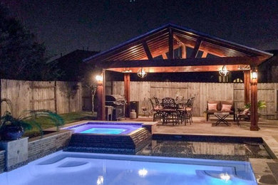 Example of a mountain style patio design in Houston