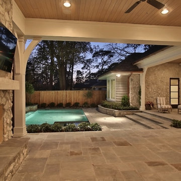 Stone and Cedar Shake come together for this Southern Living Style home