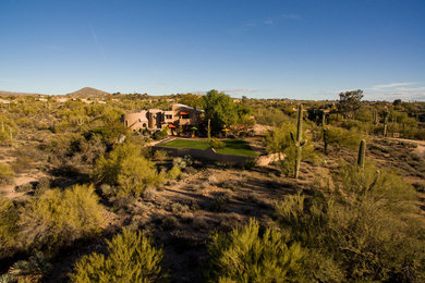 Eclectic home design photo in Phoenix