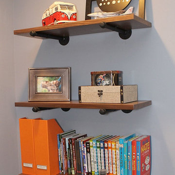 Bedroom shelves with iron pipe brackets