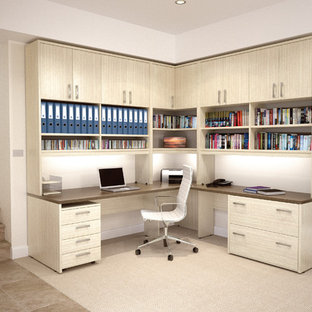 This is an example of an expansive modern home office and library in Melbourne.