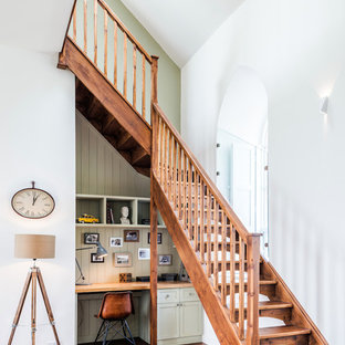 Photo of a medium sized contemporary wood l-shaped staircase in Other with open risers.