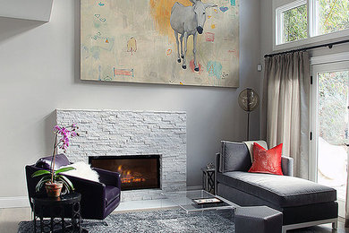 Example of a trendy light wood floor living room design in New York