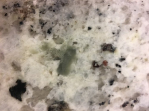 Help White Ice Granite Developing Green Spots Throughout We Are In A New Construction Home That S About To Be Five Months Old The White Ice Granite Chose Is Starting Develop Green Spots Throughout It