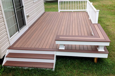 Elegant backyard deck photo in Baltimore with no cover
