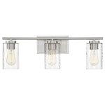 Trade Winds Lighting - Trade Winds Raymond 3-Light Bathroom Vanity Light in Brushed Nickel - If you’re looking to change things up in your bathroom, but you don’t want to or can’t paint, have you thought about getting new bath vanity lights? Putting in a different light is a fairly easy way to make a big impact without having to get out a drop cloth. Sounds good, right? The Trade Winds Raymond 3-light bath vanity light helps you achieve this change. It has a sleek look with intriguing shades of clear swirl glass and a brushed nickel finish. Can be mounted with the shades facing up or down. This fixture is dimmable and uses 3 standard size light bulbs of up to 60 watts each. LED bulbs can be used. Rated for indoor use only.  This light requires 3 , 60 Watt Bulbs (Not Included) UL Certified.