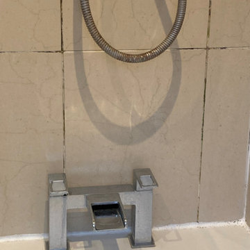Leaking Ceramic Tiled Bathroom Renovated in Woking