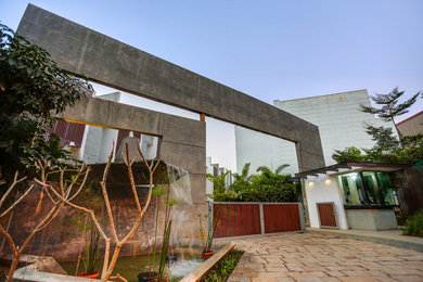 Inspiration for a contemporary exterior home remodel in Bengaluru