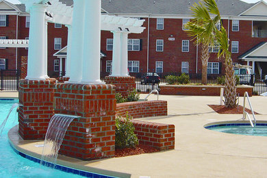 Beach style pool photo in Raleigh