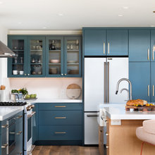 white countertops blue cabinets