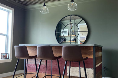 Inspiration for a rustic home bar remodel