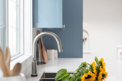 Example of a trendy kitchen design in Vancouver