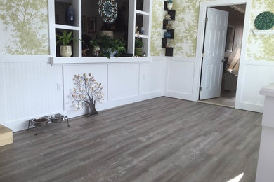 Example of a trendy living room design in Detroit