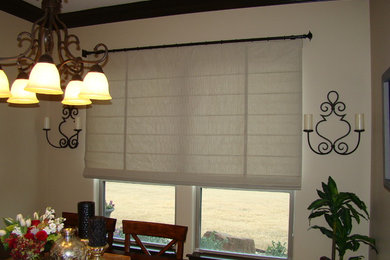 Roman shades on iron rods, a one of a kind look!