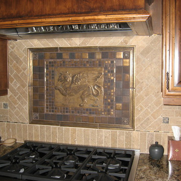 Intricate custom tile medallion in Kitchen back splash