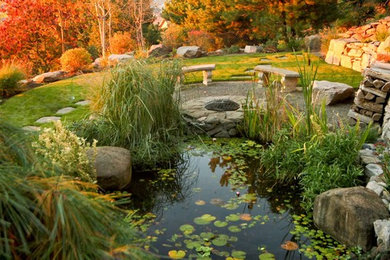 Inspiration for a large full sun backyard landscaping in Portland.