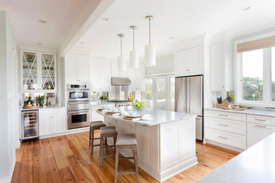 Design ideas for a beach style kitchen in San Francisco with shaker cabinets, white cabinets and stainless steel appliances.