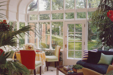 Photo of a traditional sunroom in Miami.