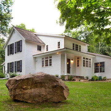 Farmhouse Addition - after - 2 story terraced addition
