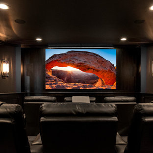 Home theater - huge contemporary enclosed home theater idea in Chicago with gray walls and a projector screen
