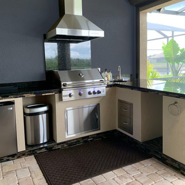 Outdoor Kitchens featuring a ZLINE Stainless Steel and Copper Outdoor Range Hood