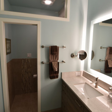 Beautiful modern bathroom with linear sensibilities