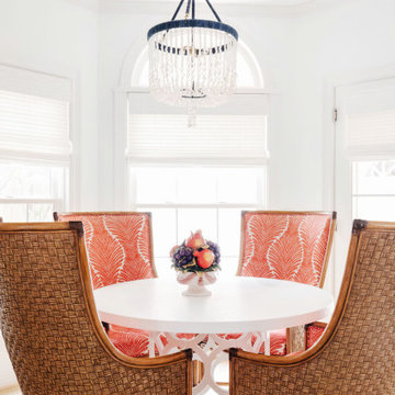Bright Dining Room Design in Houston, TX with Textured Seating and Crystal Light