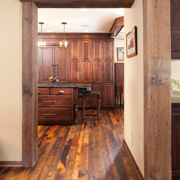 Reclaimed Wood Box Beams and Timber Post Framing a Hallway Entry