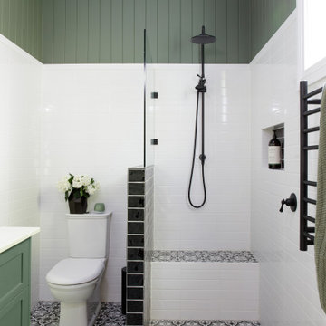 Shower, nib wall, niche, and toilet