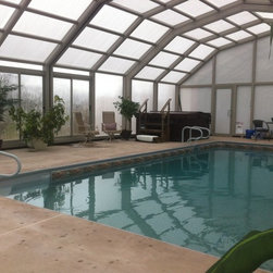Indoor Pool Setting with our Retractable Pool Enclosures - Products