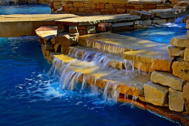 Terraced Stone Spillway on pool - By Dominion Pool Group, Inc.