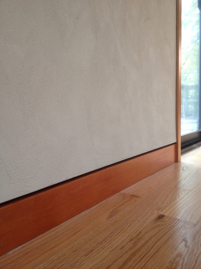 Plaster with flush baseboard