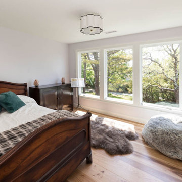 Light-Filled Bedroom with Garden Views and Warm Wood Accents – Cape Ann MA