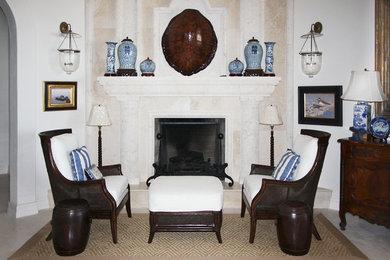 Living room - large coastal formal and open concept limestone floor living room idea in Jacksonville with white walls, a standard fireplace, a stone fireplace and no tv