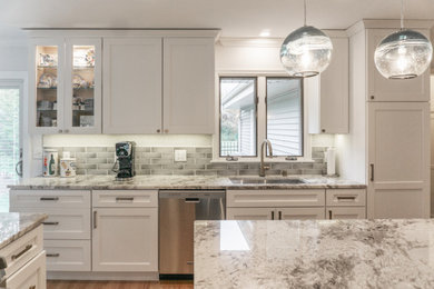 Example of a farmhouse home design design in Milwaukee