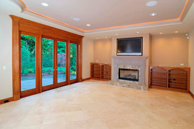 Example of a ceramic tile living room design in Orange County with beige walls