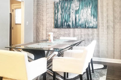 Inspiration for a mid-sized modern dark wood floor and brown floor enclosed dining room remodel in Chicago with gray walls